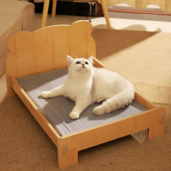 couchage pour chat en bois